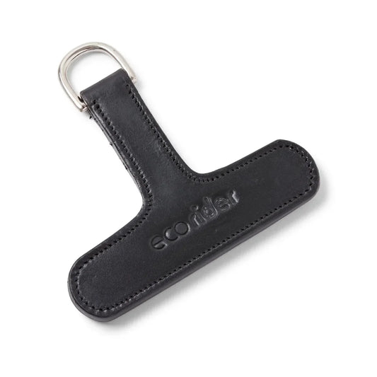Black EcoRider Crupper T Leather Attachment showing the T-bar shape, debossed brand name, and stainless steel D-ring.