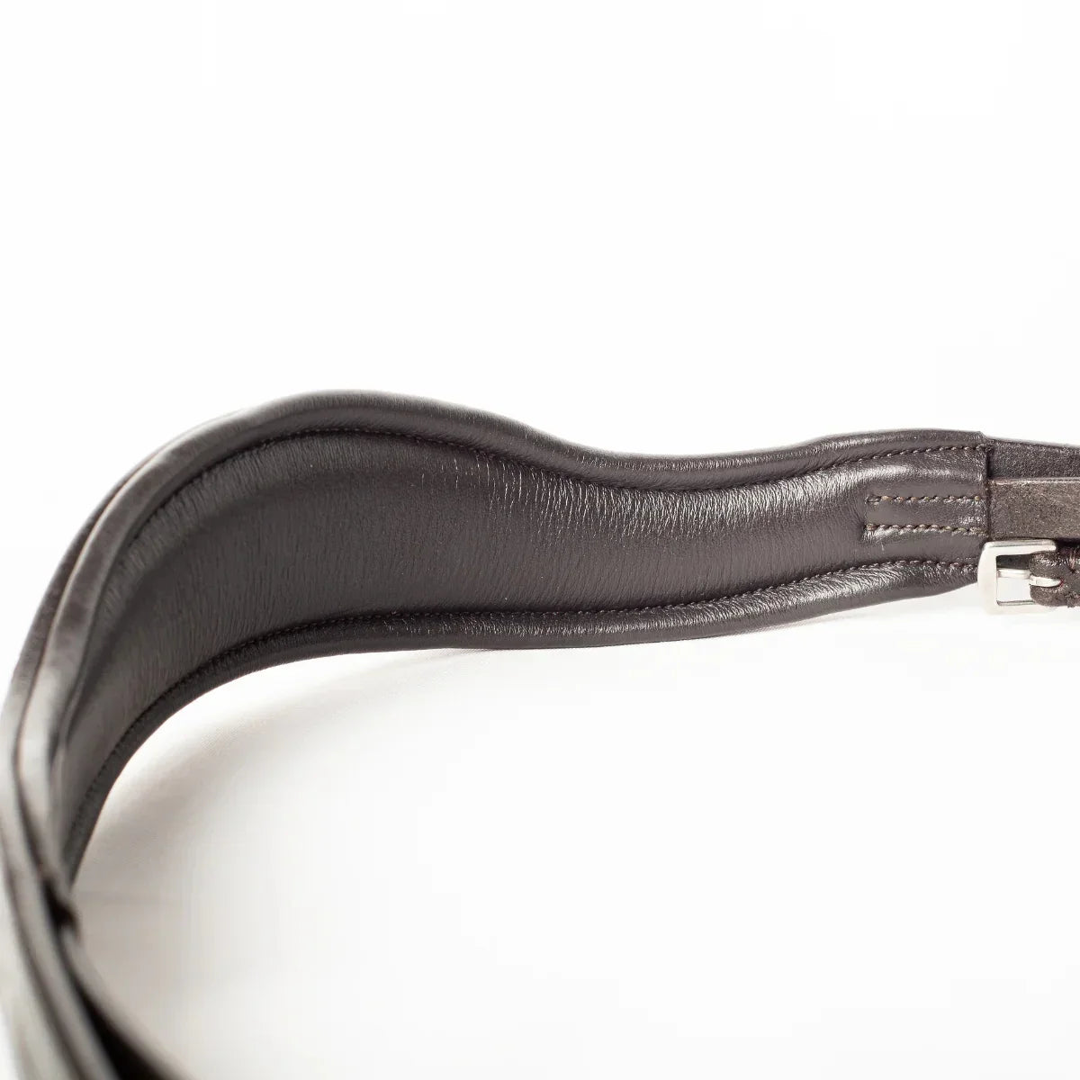 Detailed close-up of the supple, grain-textured brown leather padding on an EcoRider SeamFree anatomic bridle component.