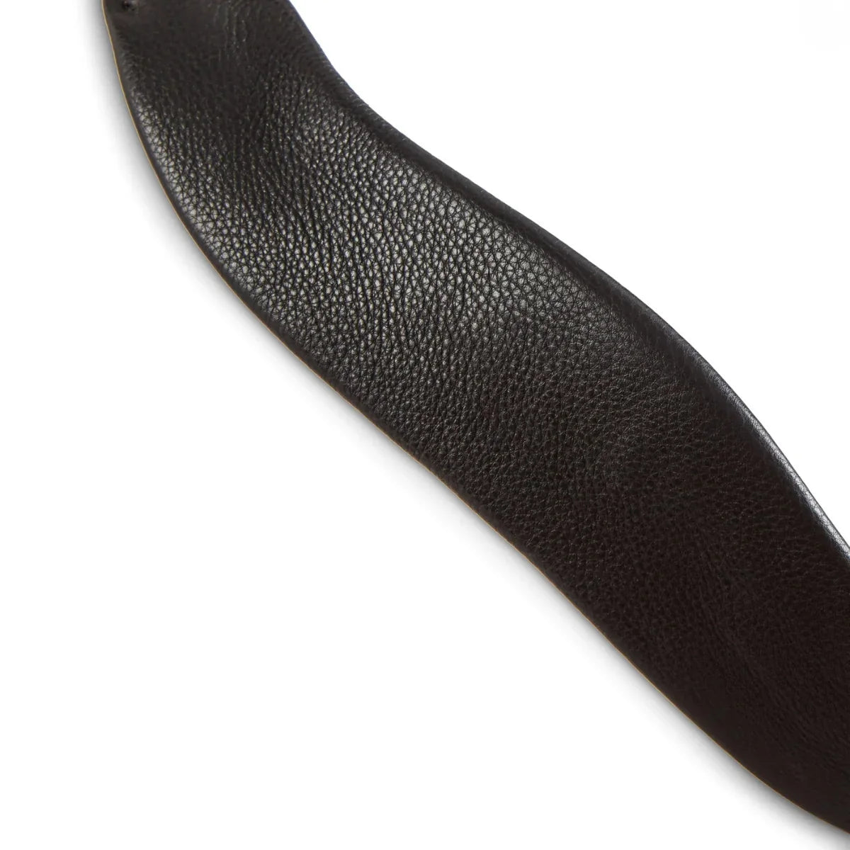 Detailed close-up of the supple, grain-textured black leather padding on an EcoRider SeamFree anatomic bridle component.