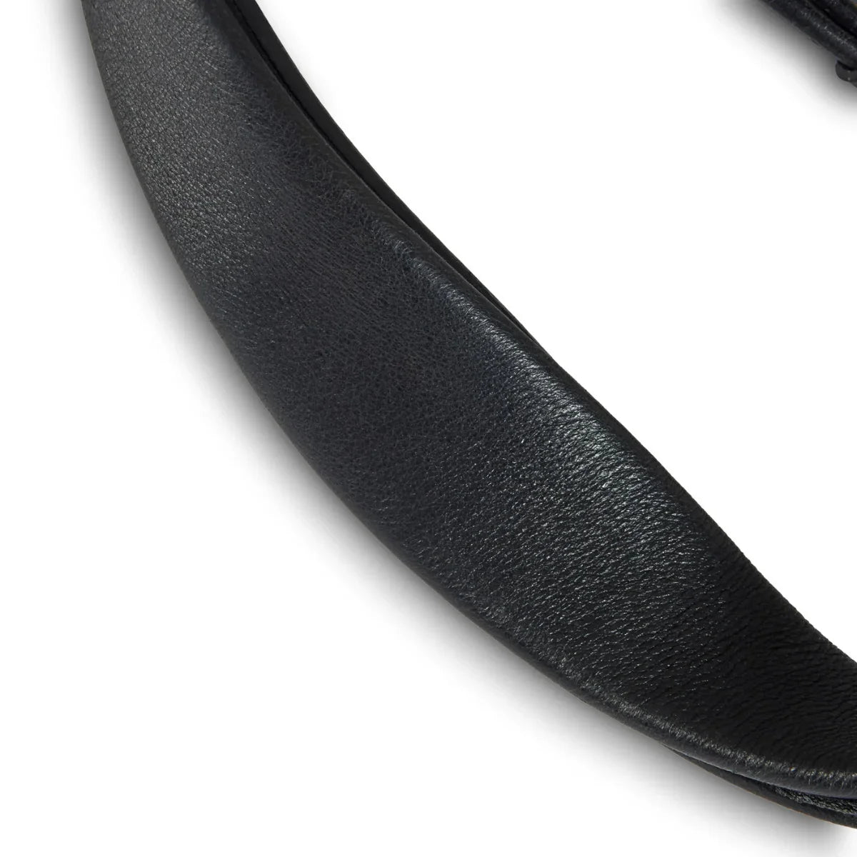 Close-up view of the supple, grain-textured black leather on an EcoRider Ultra Comfort padded bridle component.