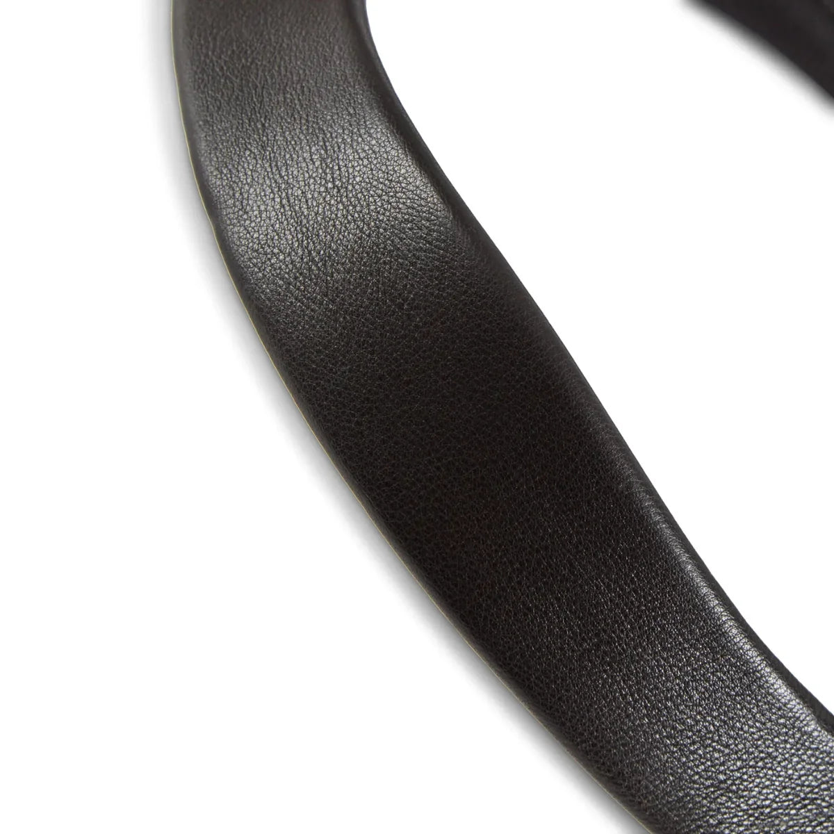 Detailed close-up of the supple, grain-textured black leather padding on an EcoRider SeamFree anatomic bridle component.