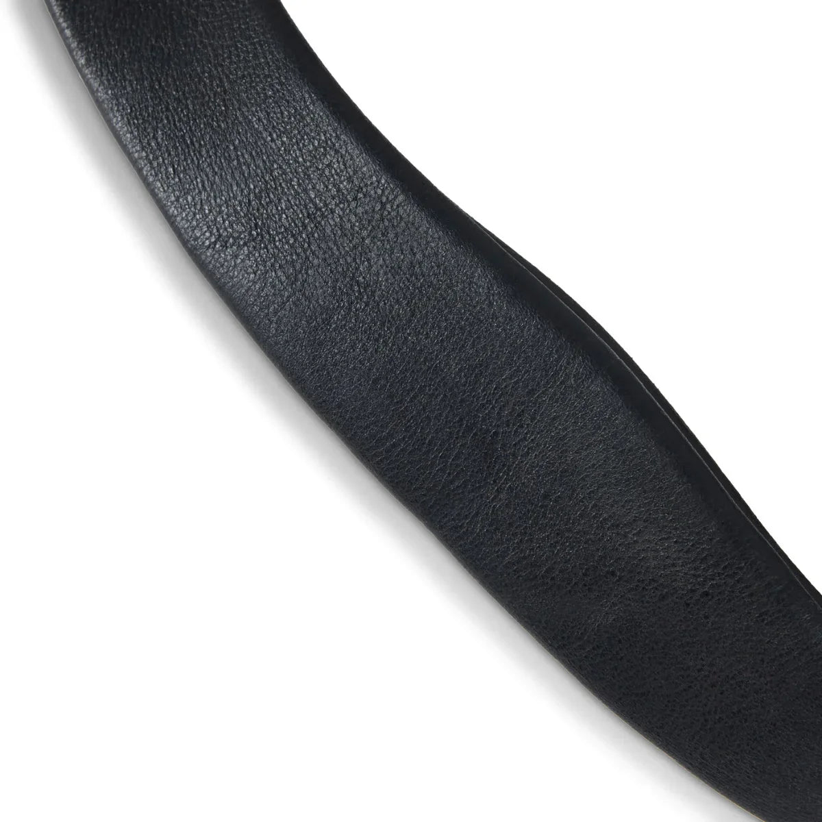 Close-up view of the supple, grain-textured black leather on an EcoRider Ultra Comfort padded bridle component.